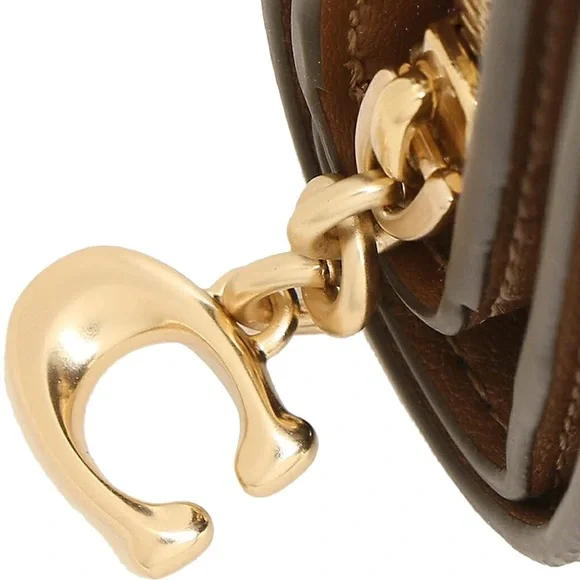 Coach Snap Wallet With Horse And Carriage Dot Print.
L: 4.25" W:1" H:3.5" - Picture 7 of 12